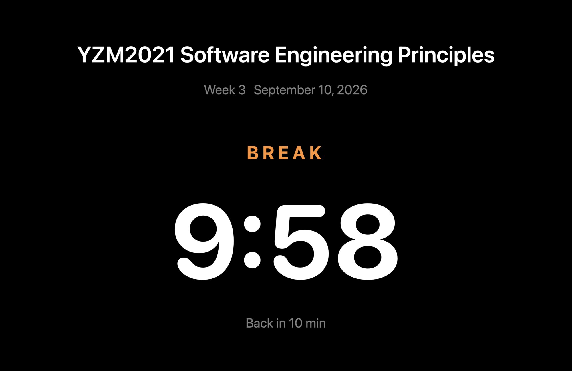 The audience screen during a break: course title, unit and date, BREAK, a large countdown, and Back in 10 min